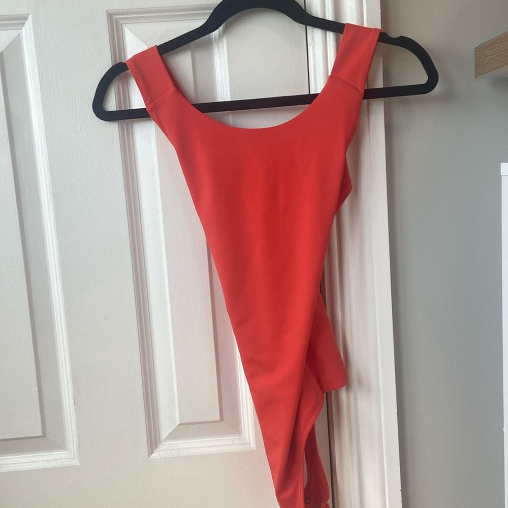 Coral Criss-Cross Back Express Bodysuit